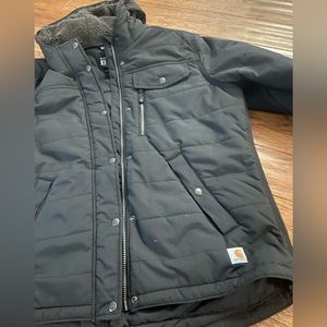 Woman's black Carhartt winter coat